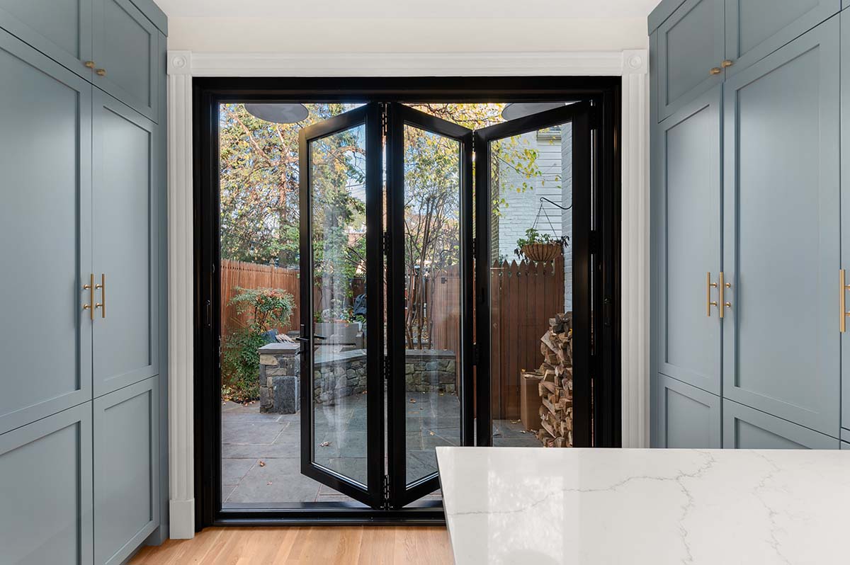 Restored brick rowhouse rear addition and garden courtyard
